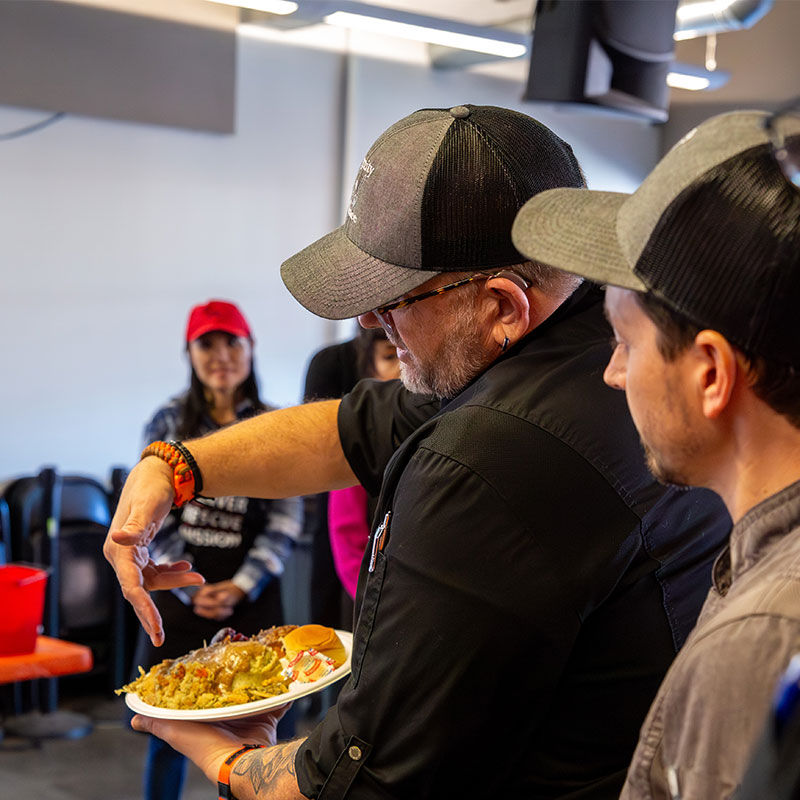 Chef with Thanksgiving meal