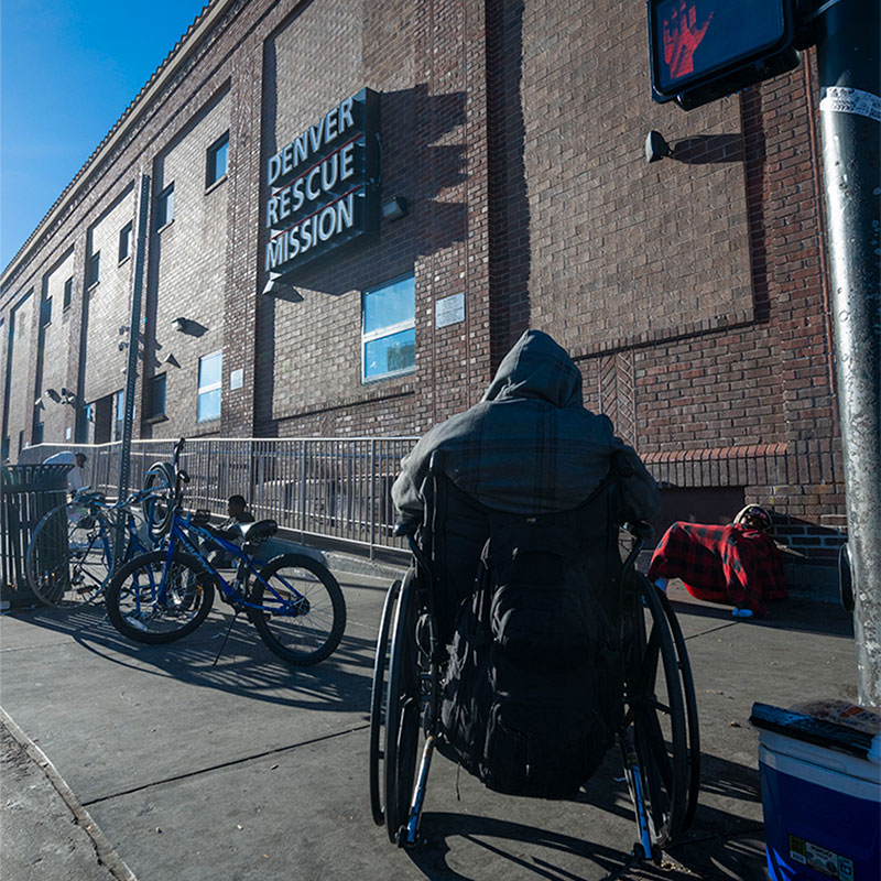 Guest in wheelchair outside of shelter