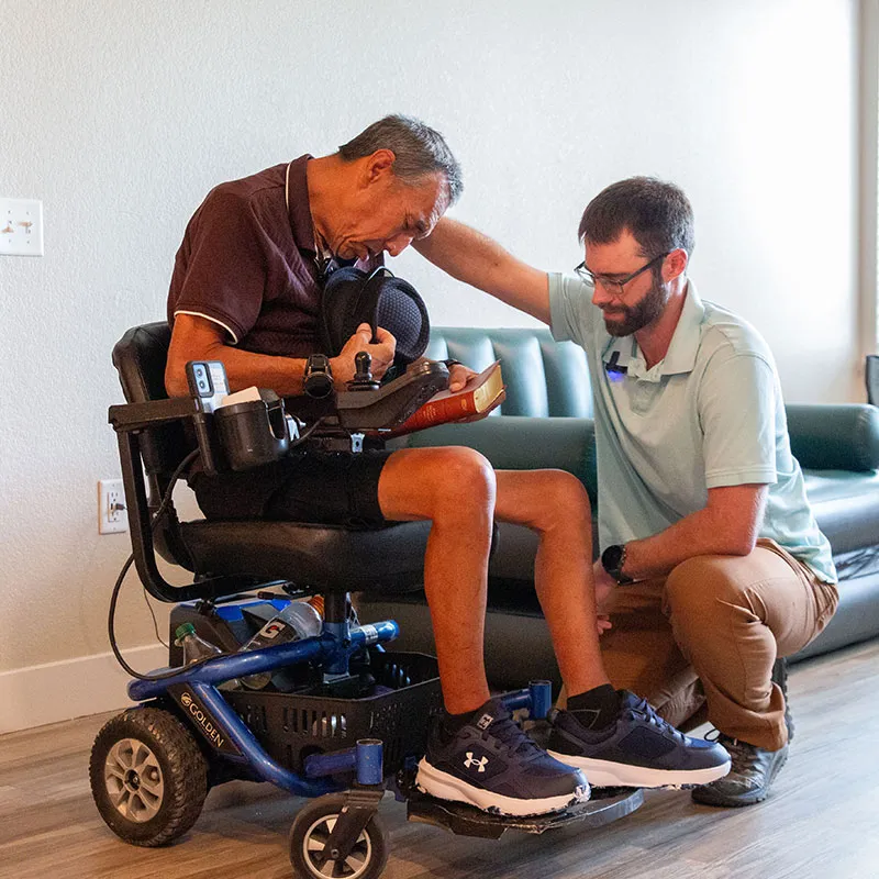 Chaplain Josh praying over Randy