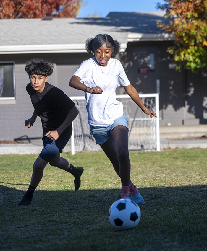 Children from the Youth Center playing soccer